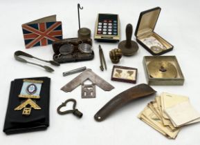 A collection of various items including silver Masonic jewel, compact with Royal Navy badge,