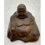 A small seated bronze figure of Buddha, height 4.5cm