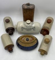A collection of antique hot water bottles