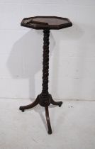 An antique octagonal wine table, on barley-twist tripod stand - two pieces loose but present