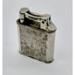 A vintage silver plated Dunhill lighter