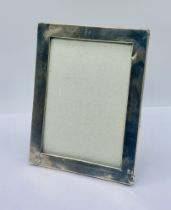 A hallmarked silver photo frame