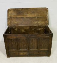 An antique oak and elm mule chest with two drawers - length 127cm, depth 56cm, height 75cm