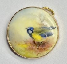 A Royal Worcester pendant of a blue tit with a 9ct gold mount, indistinct signature