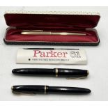 A cased Parker 61 gold plated fountain pen along with a Parker Duofold and a Parker Slimfold