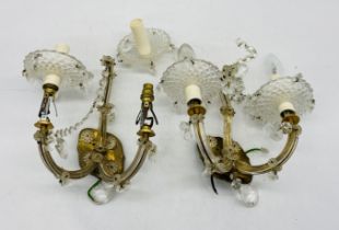 A pair of Edwardian glass wall lights