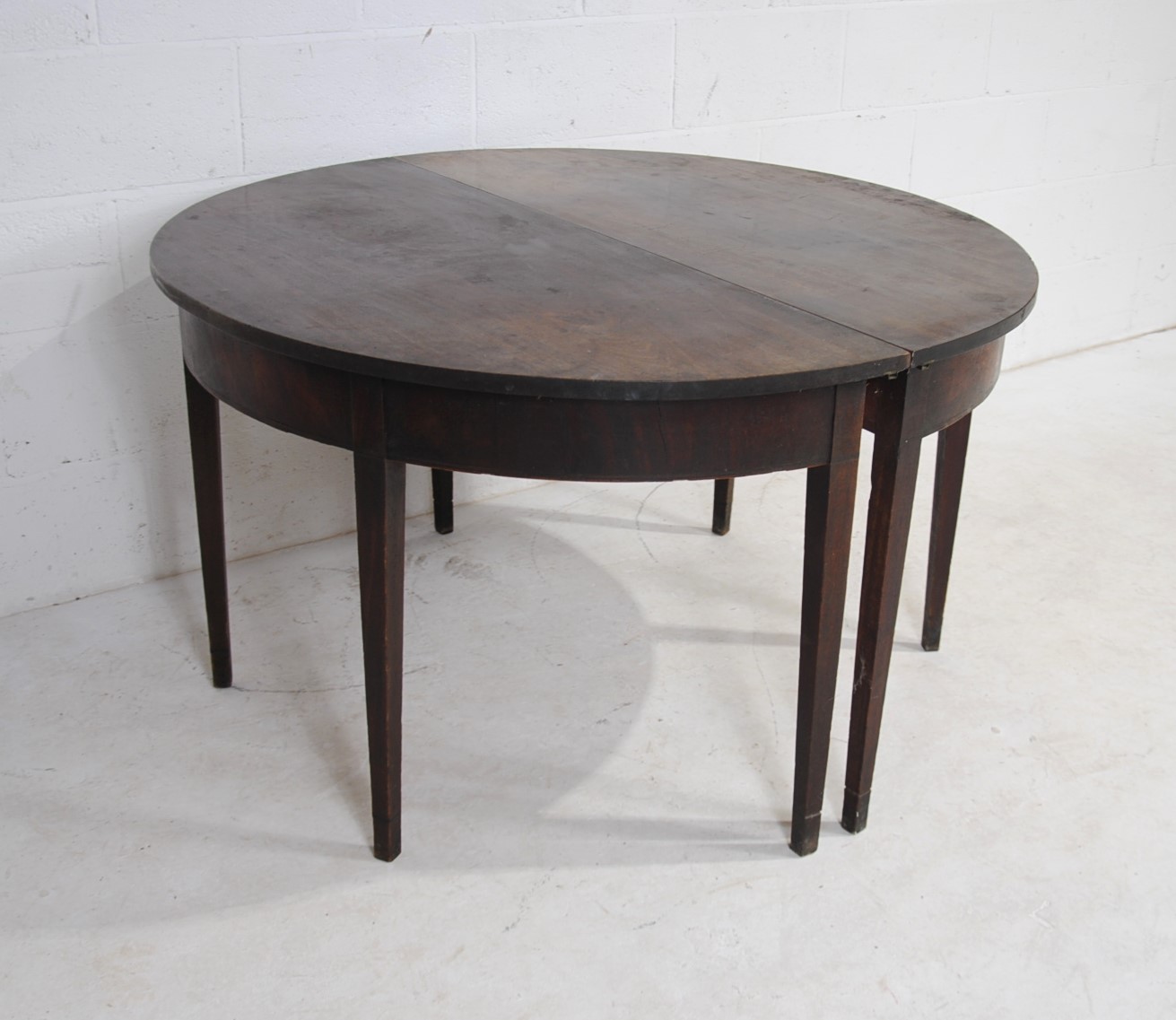 A pair of Georgian mahogany demi lune tables, raised on tapering legs - Image 4 of 8