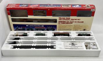 A boxed Lemax Christmas village train set