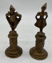 A pair of bronze figures of Art Deco Pierrot and Pierrette standing on plinths, height 13cm