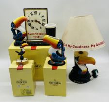 Three boxed Guinness Toucan ceramics by Enesco including a clock, small jug and collectable