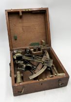 An early 20th century Henry Hughes & Son sextant with ladder frame in wooden case with related