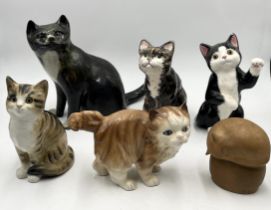 A collection of studio pottery cats including Babbacombe pottery