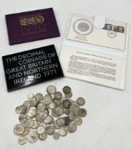 A collection of silver and part silver coinage along with two coin sets