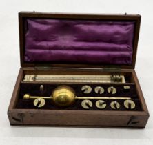 A wooden cased Sikes Hydrometer by G.Bedwell, 4 Little Alie Street, London