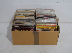 A collection of mostly rock and punk 7" vinyl records, including Alice Cooper, Rainbow, Def Leppard,