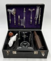 A cased electrotherapy device with assorted instruments "Homo-Flux" made in France