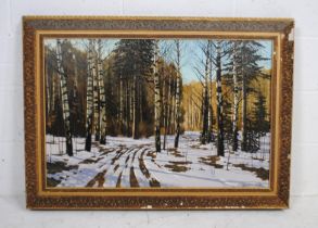 A gilt framed oil on canvas of a winter landscape, signed 'A Bulakov?, 1990' - frame A/F - 108cm x