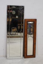 Two wall hanging mirrors, the largest measuring 35 x 115cm