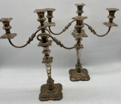 A large pair of three branch silver plated candelabra, height 47cm