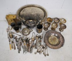 A quantity of silver plated items, including a large platter, teapot, various cutlery etc.