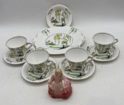 A 'Standard China' Pagoda patterned part tea set along with a Royal Doulton figurine "Rose"