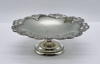 A small hallmarked silver sweetmeat dish on plinth by Elkington & Co.