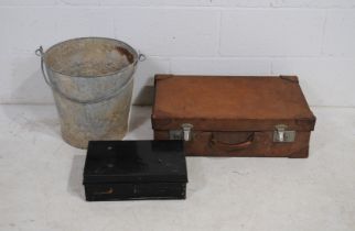 A vintage leather suitcase, along with a metal box and a galvanised bucket