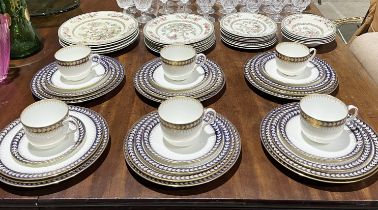 A Wedgewood part dinner set with cobalt and gilt decoration along with an Indian Tree part service