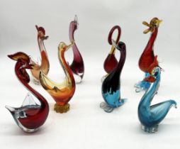 A collection of eight art glass birds including a number of Murano pieces