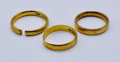 Three 22ct gold wedding bands- 1 A/F, total weight 14.2g