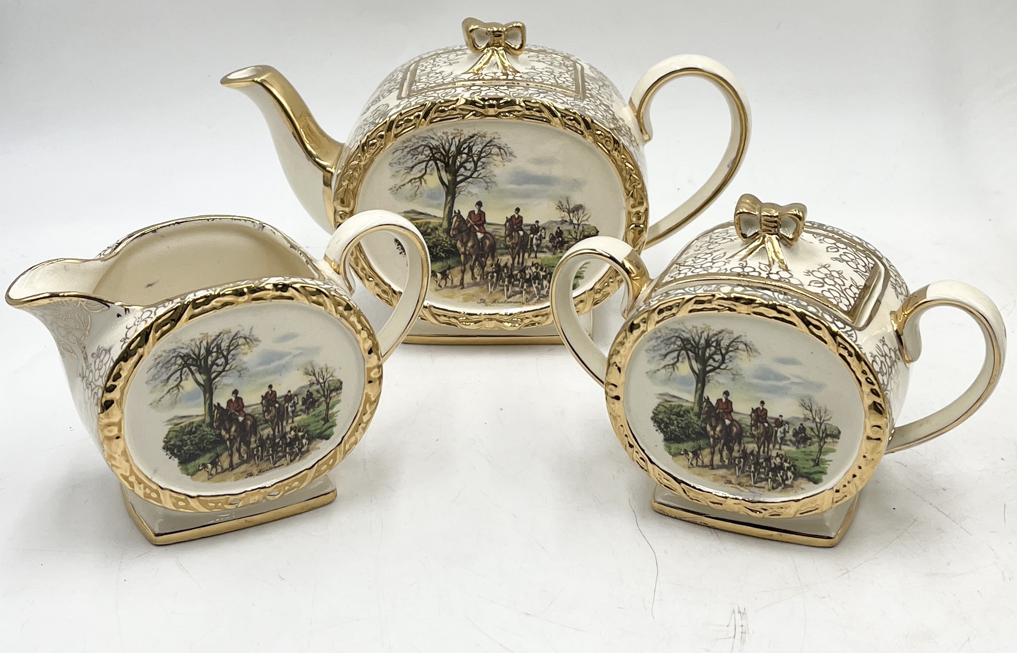 A gilt glass jug and six glasses along with a Sadler's teapot, sugar bowl and jug all decorated with - Image 2 of 5