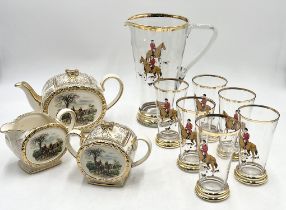 A gilt glass jug and six glasses along with a Sadler's teapot, sugar bowl and jug all decorated with