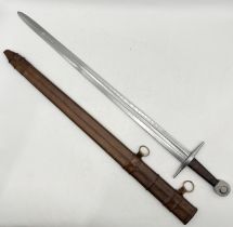 A Sir William Marshall replica sword with leather scabbard