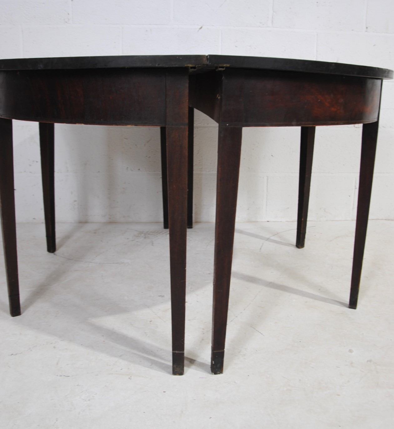 A pair of Georgian mahogany demi lune tables, raised on tapering legs - Image 5 of 8