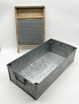 A vintage washboard and galvanised Tote Pan