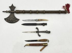 A collection of weaponry including replica ceremonial axe, William Rodgers antler handled dagger,