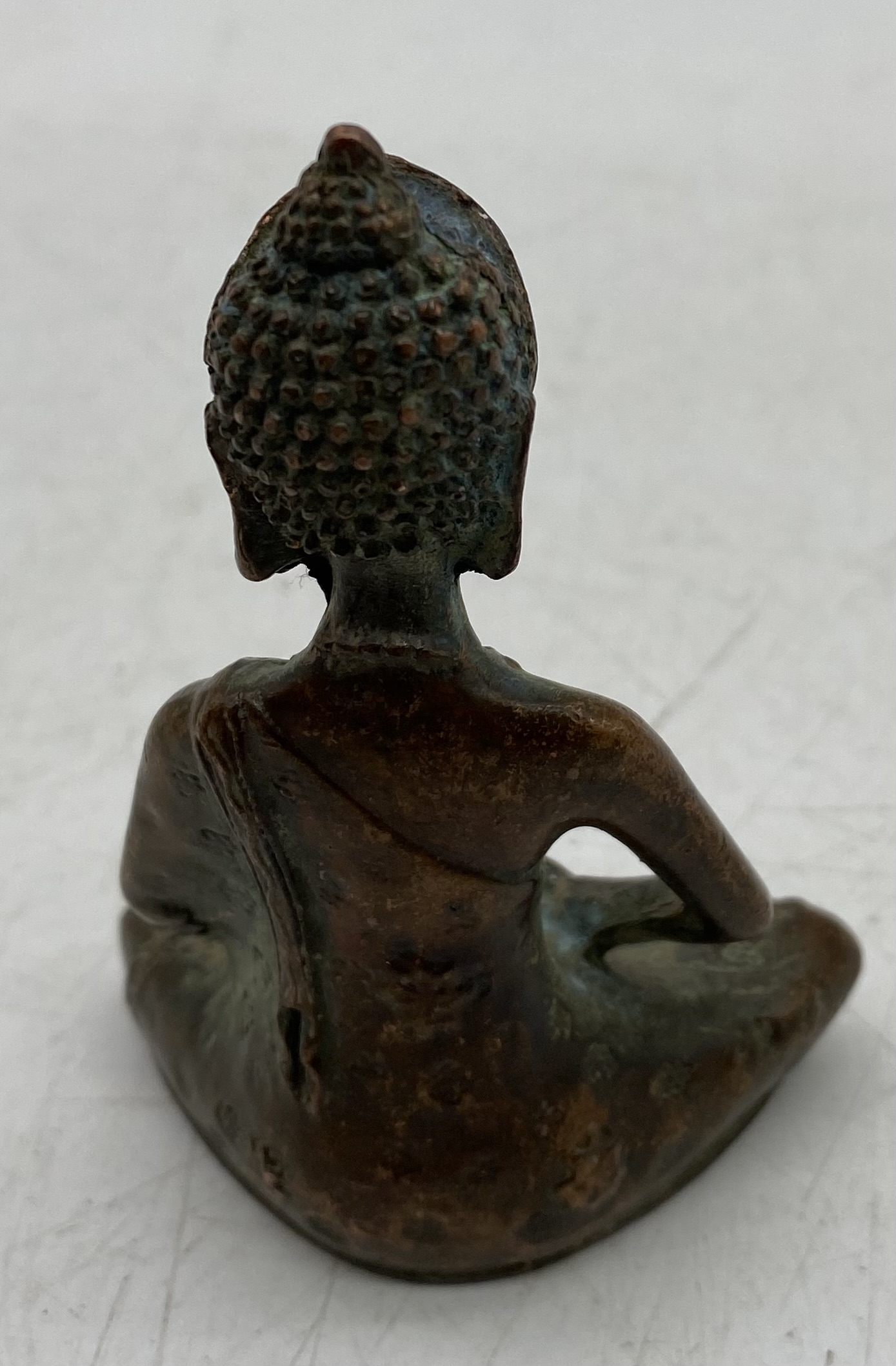 A seated bronze figure of Tibetan Buddha, height 8.75cm - Image 3 of 5