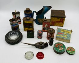 A small collection of automobilia items including a Shell oil can, Davies trye in the form of an