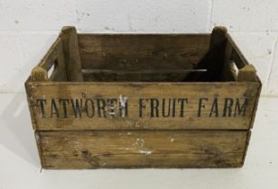 A vintage wooden apple crate, marked Tatworth Fruit Farm (local interest)