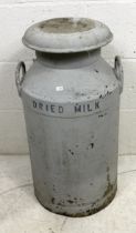 A "Dried Milk Products Ltd" vintage milk churn