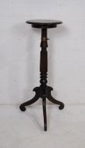 An antique mahogany adjustable plant stand