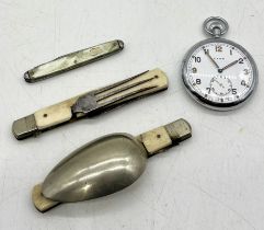 A Cyma military pocket watch marked GTSP along with folding campaign knife and fork etc.