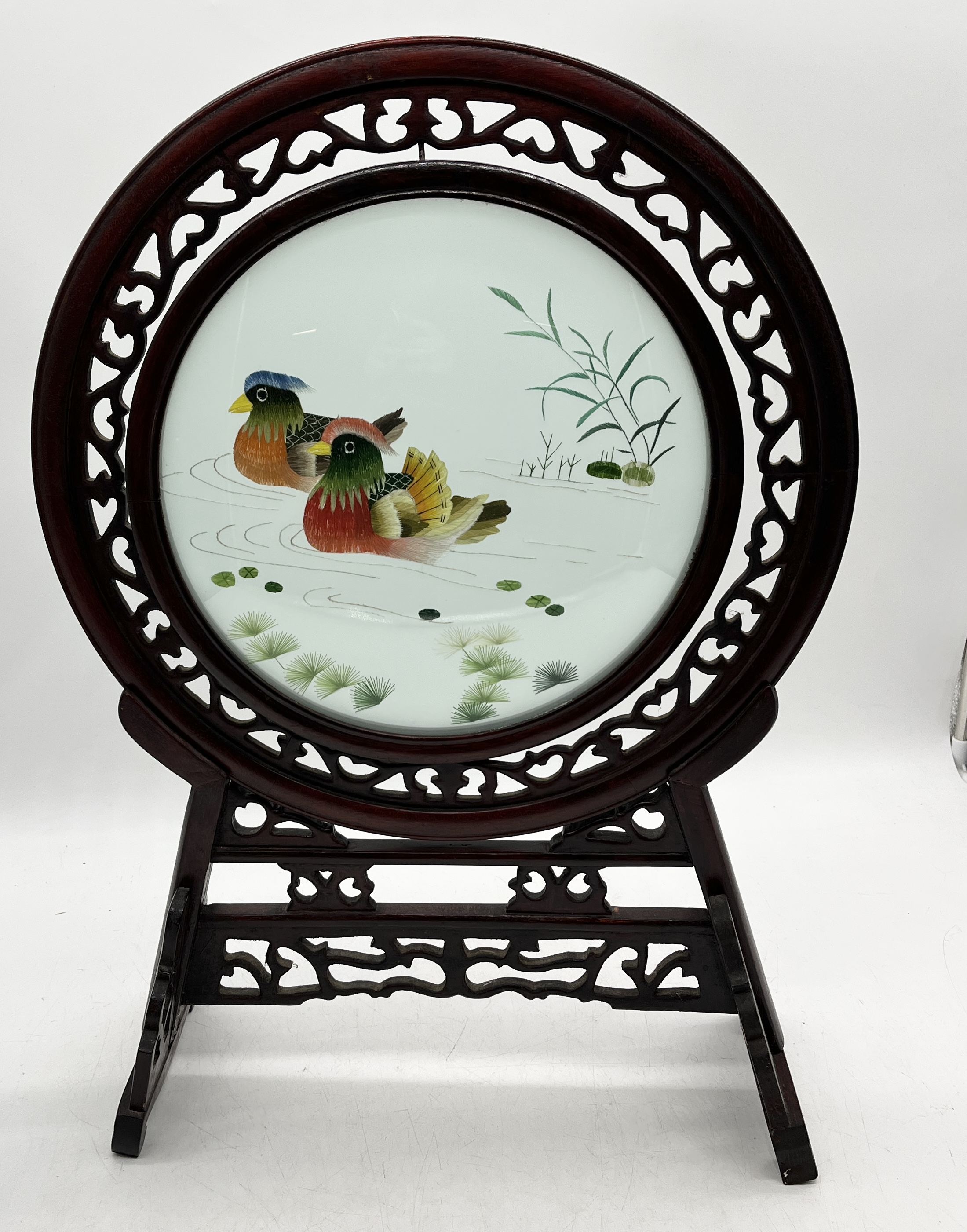 A Chinese hardwood table screen with embroidered panel of ducks on the water on ornately carved - Image 3 of 4