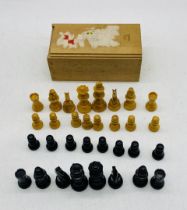 A boxed wooden chess set