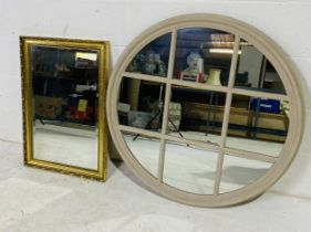 A gilt framed mirror (overall size 75cm x 51cm), along with a modern vintage style taupe round