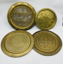 Four Eastern brass trays