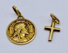 An 18ct gold St Christopher along with an 18ct cross, total weight 2.3g