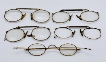 Five pairs of antique spectacles- one pair with no glass