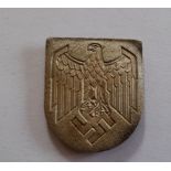 WW11 German, National Emblem, Tropical metal helmet badge with pins from Duxford Aviation
