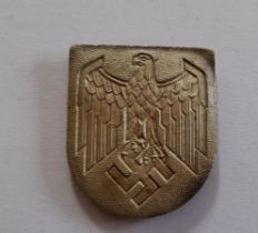 WW11 German, National Emblem, Tropical metal helmet badge with pins from Duxford Aviation